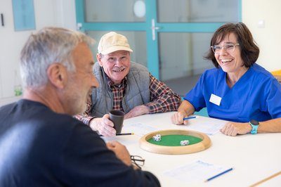 Pflegerin mit Patienten