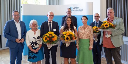 Die Referent:innen des Nachmittags und die neue Führungsriege des Maßregelvollzugs im Landeskrankenhaus.